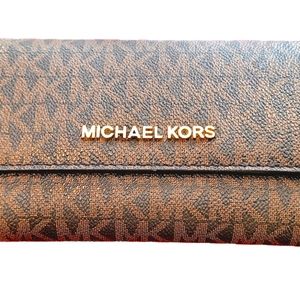 Michael Kors Tri fold monogrammed wallet